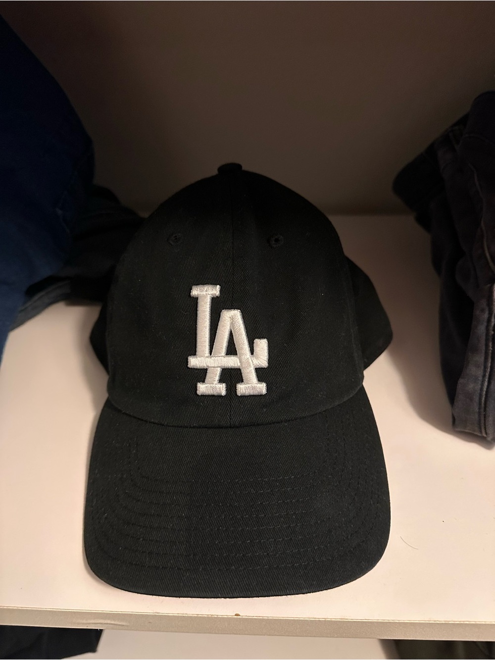 47 men’s/woman Black Baseball Cap with White LA Logo